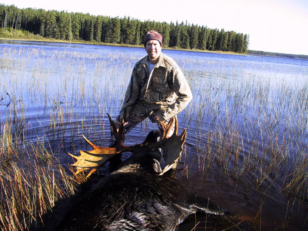 Hunter next to 51 Incher Taken Bull